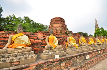 Fototapeta na wymiar Row of Buddha Statue in Ayutthaya, Thailand