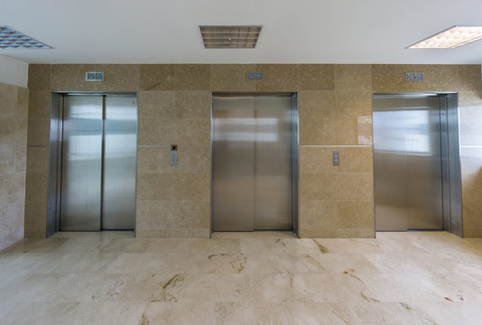 Modern elevators with closed doors