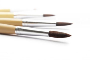 Fototapeta premium paintbrush for painter isolated on white background