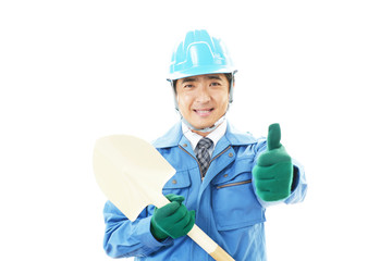 ガッツポーズの作業員