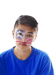 boy with stars and stripes face paint