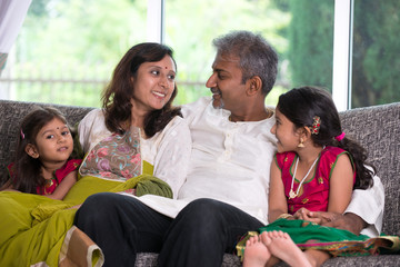 happy indian family enjoying quality time at home indoor