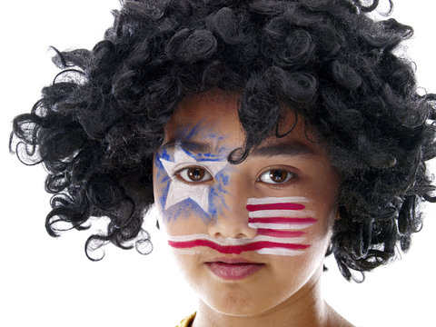 boy with stars and stripes face paint
