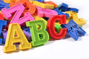 Fototapeta premium Plastic colored alphabet letters ABC