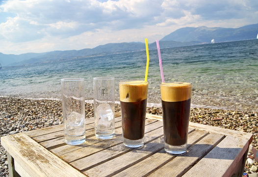 espresso  cold coffee - sea beach