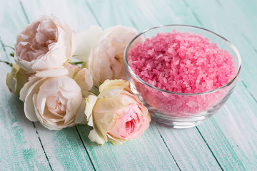 Sea salt in bowl with roses