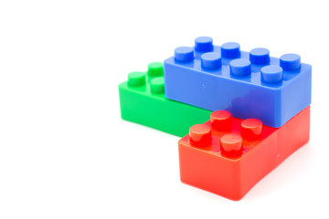 Fototapeta premium blocks Plastic building blocks on white background