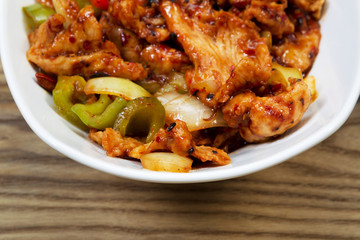 Spicy Chinese Chicken dish in White Bowl