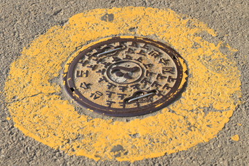 manhole on the street in Seoul, South Korea