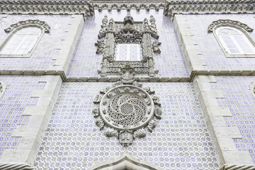 Old facade with typical tiles from Lisbon