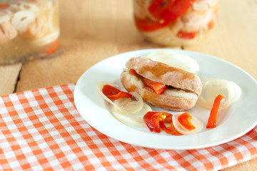 traditional czech pickled sausages with onion and red pepper