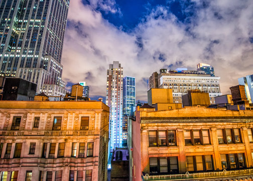 Stunning Manhattan night view. Skyscrapers and old buildings of
