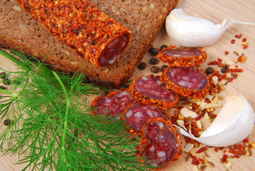 dry cured sausage,dried spicy sausage on board