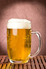 Golden light beer in mug