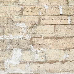 Old white brick wall fragment