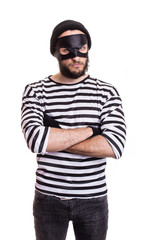 Angry thief with mask isolated on white background