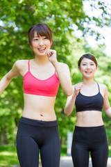 young asian women jogging in the park