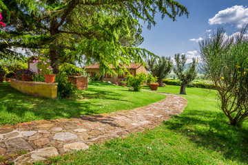 Fototapeta premium Stone road to the country house, Tuscany