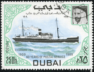 stamp printed in Dubai shows ship