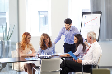 Business people discussing at meeting