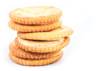 Peanut butter cream and biscuit in white background