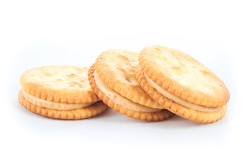 Peanut butter cream and biscuit in white background