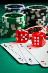  the red casino dice and poker cards