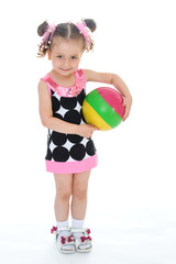 Fototapeta na wymiar Little girl with the ball