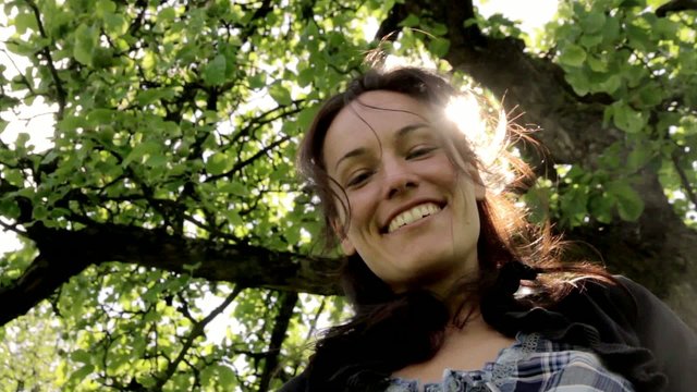 Happy, natural woman in the sun