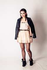 Rock style beautiful young woman. model. evening dress