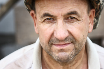 Portrait of happy middle aged smiling man