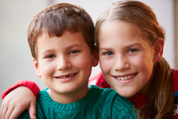 Indoor Portrait Of Brother And Sister