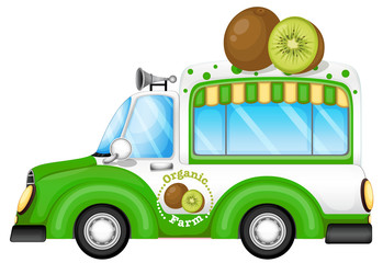 A green vehicle selling kiwi fruits