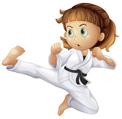 A brave young girl doing karate © GraphicsRF