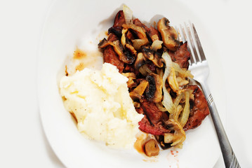 Mashed Potatoes Served with Onions and Mushrooms