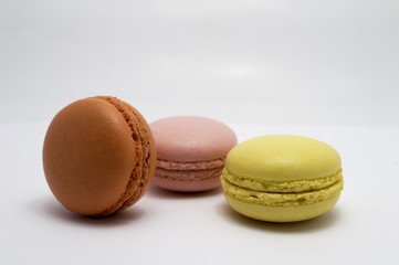 yellow, orange and pink macaroons