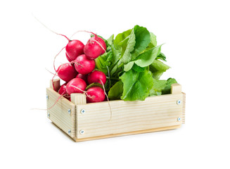 Bunch of radishes in a wooden box