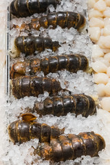 Fresh lobsters on ice in a local foodmarket