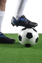 Fútbol, balón y pie de jugador