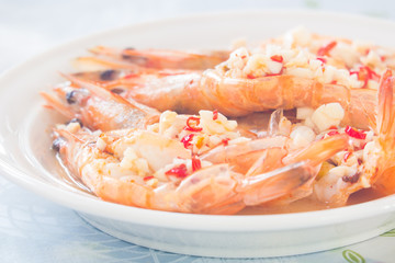cooked prawn with the chili and garlic on top
