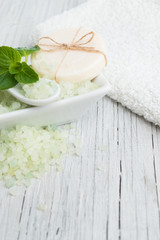 Fototapeta na wymiar Natural soap with salt and mint herbs