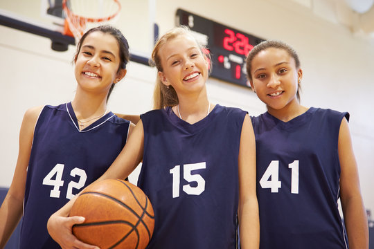 Members Of Female High School Basketball Team - Powered by Adobe