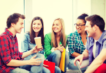 students communicating and laughing at school