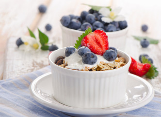 Muesli and yogurt with fresh berries