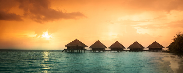 Over water bungalows with steps - obrazy, fototapety, plakaty