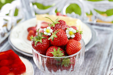 Glass bowl of strawberries