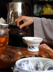 Chinese tea ceremony is performed by Buddhist monk