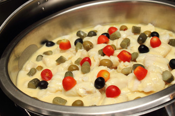 fresh fish with a sauce of cream.