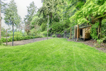 Backyard with fenced garden bed