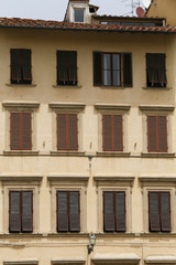 Typical facade with windows of Tuscan architecture. florence, It